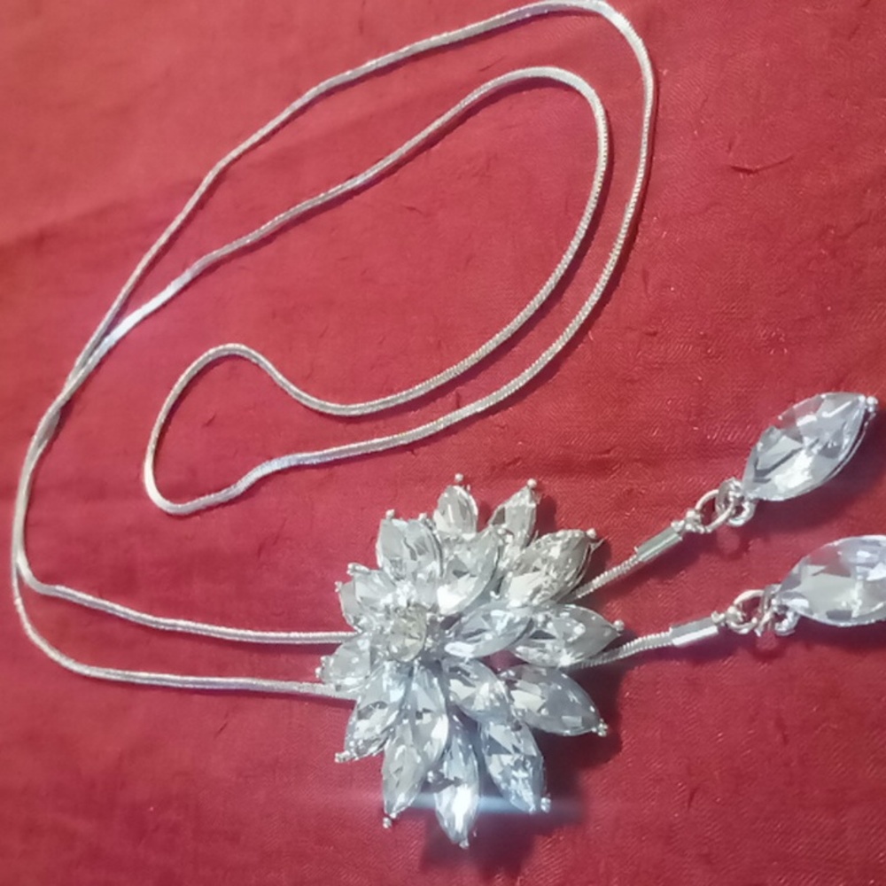 Lariet slide necklace 28 in to choker, silver tone Crystal starburst NWT